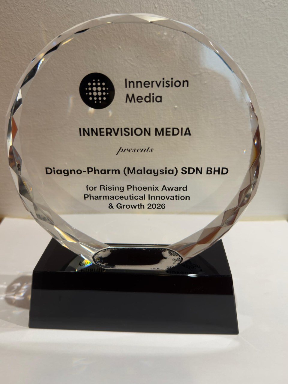 Rising Phoenix Award 2026 — glass trophy